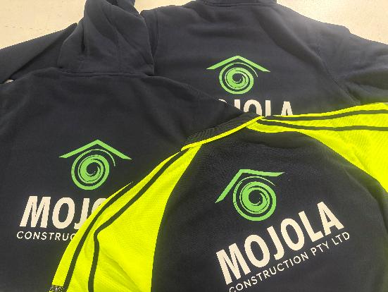 Custom branded workwear with company logo for business uniforms